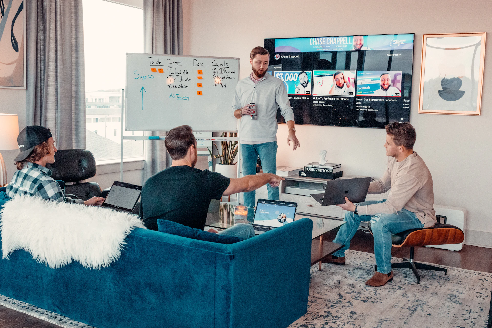 A software team working together around a table in a bright office